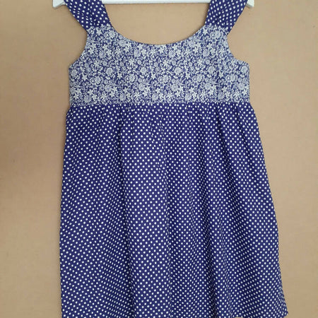 Cute size 6 child's dresses. One-Of-A-Kind Print Bodice with Contrasting Spots. Available in 2 colours.