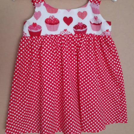 Cute size 3 child's dresses. One-Of-A-Kind Print Bodice with Contrasting Spots. Available in 2 colours.