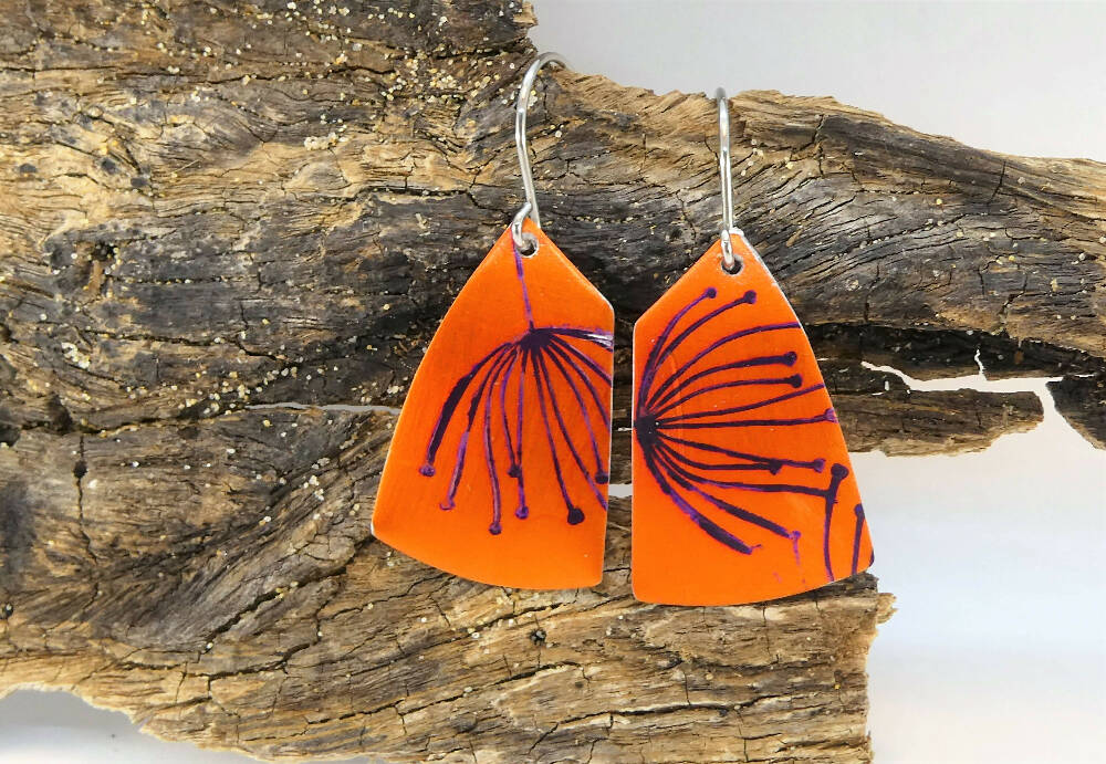 Printed and dyed orange and black anodised aluminium earrings