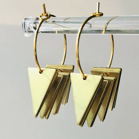 Geometric brass triangle hoop earrings.