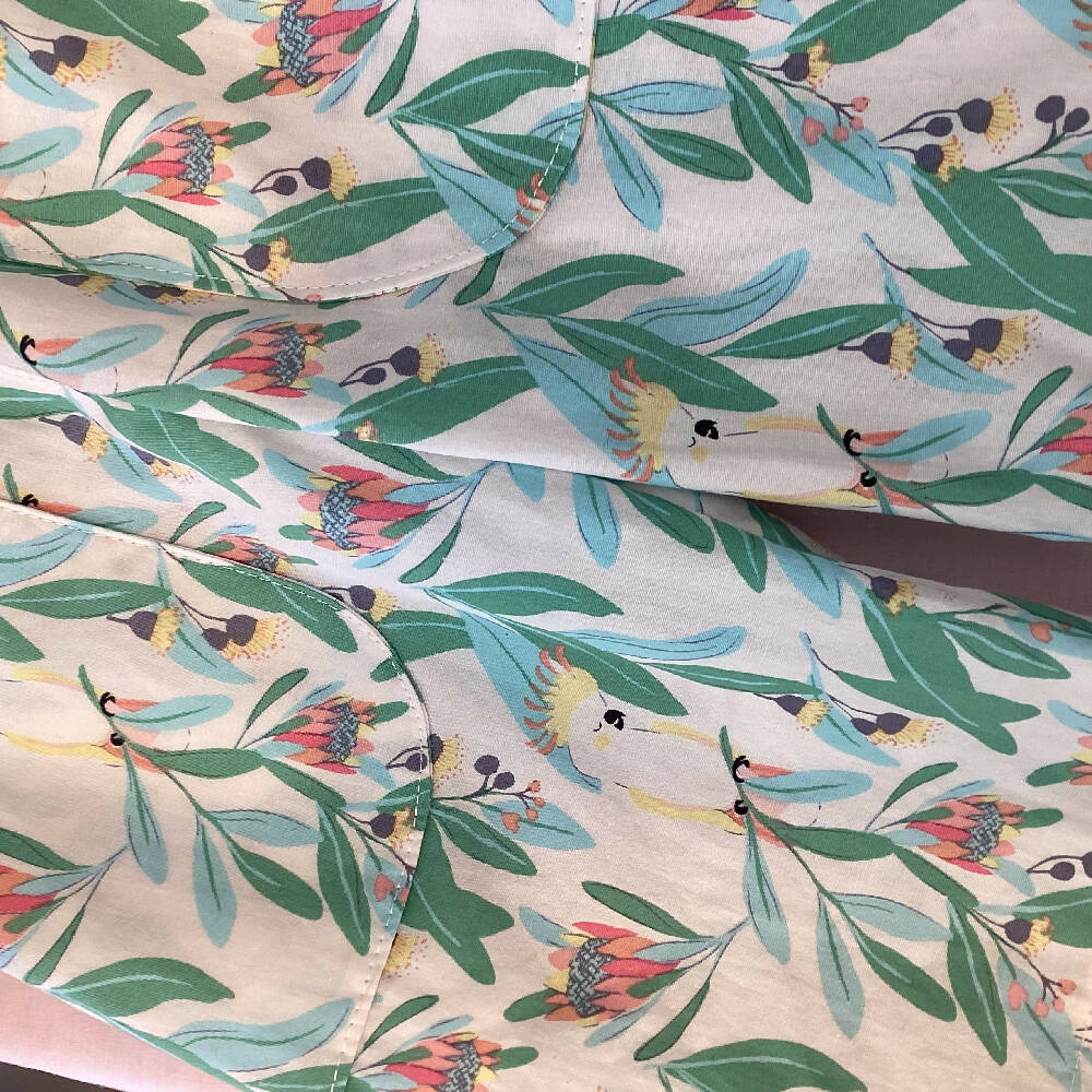 Boys/Girls Bermuda style shorts in cockatoo fabric