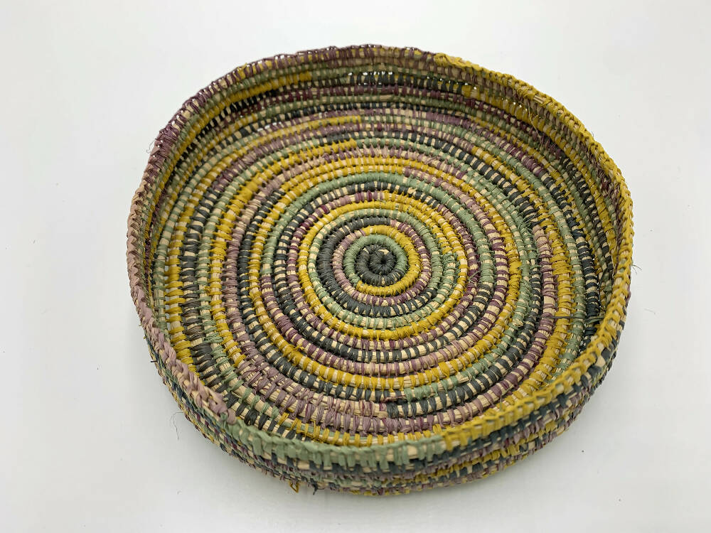 Raffia basket in mustard yellow, grey, green, purple and natural colours
