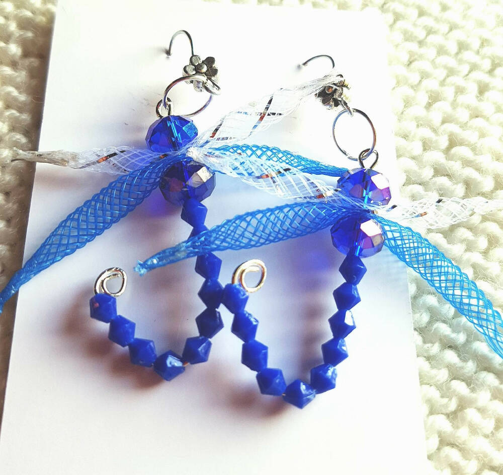 Dangle earrings. Dragonfly nylon mesh and crystals.