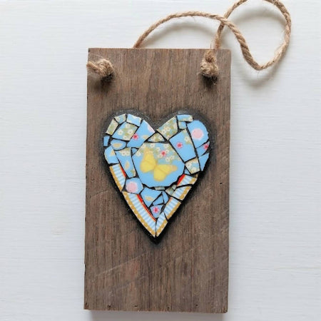 Broken china mosaic heart wall hanging, yellow butterfly mosaic on old timber