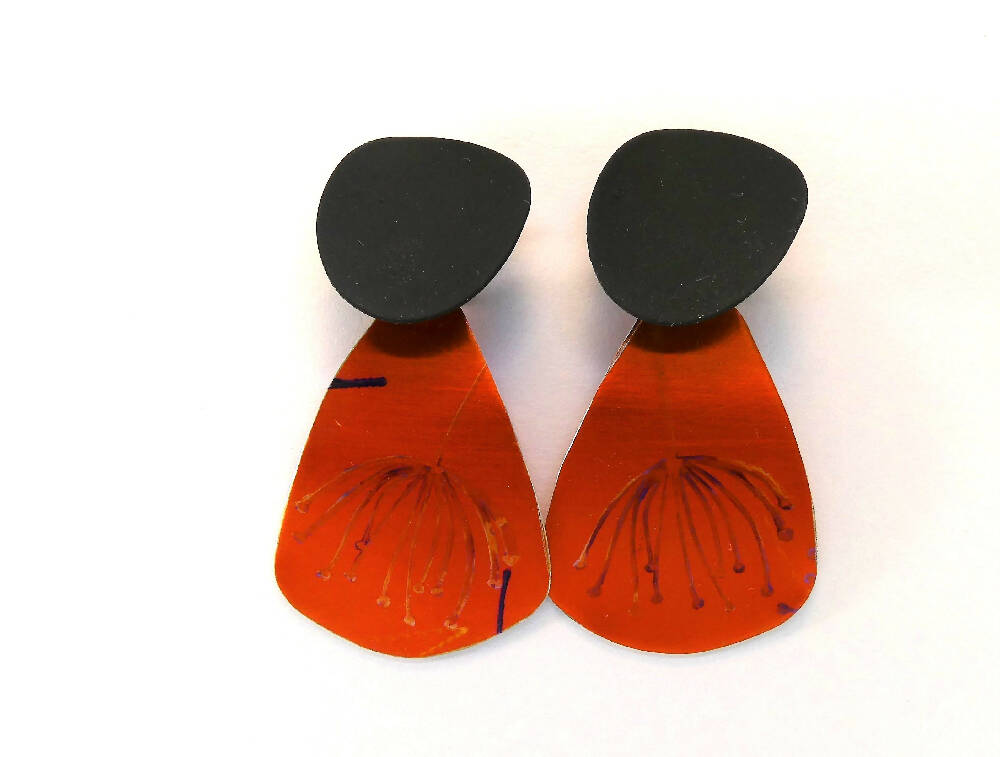 Printed and dyed orange and black anodised aluminium earrings