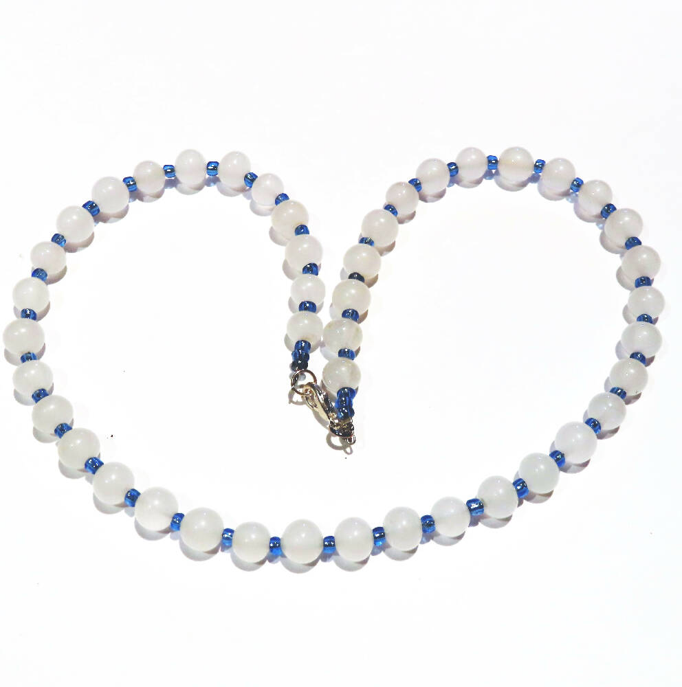 Beaded necklace. Opauqe white and blue glass beads