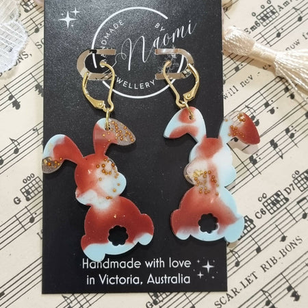 Red, blue and gold resin rabbit dangle earrings
