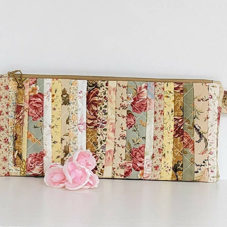 Rose printed machine quilted bag/pouch.