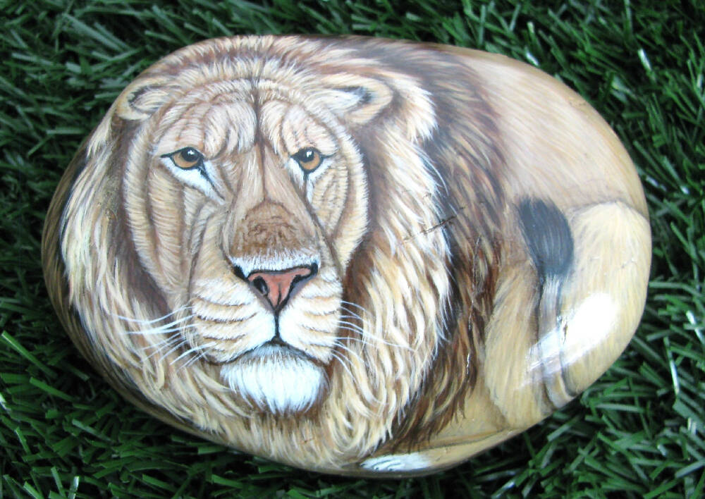 Lion hand painted on stone