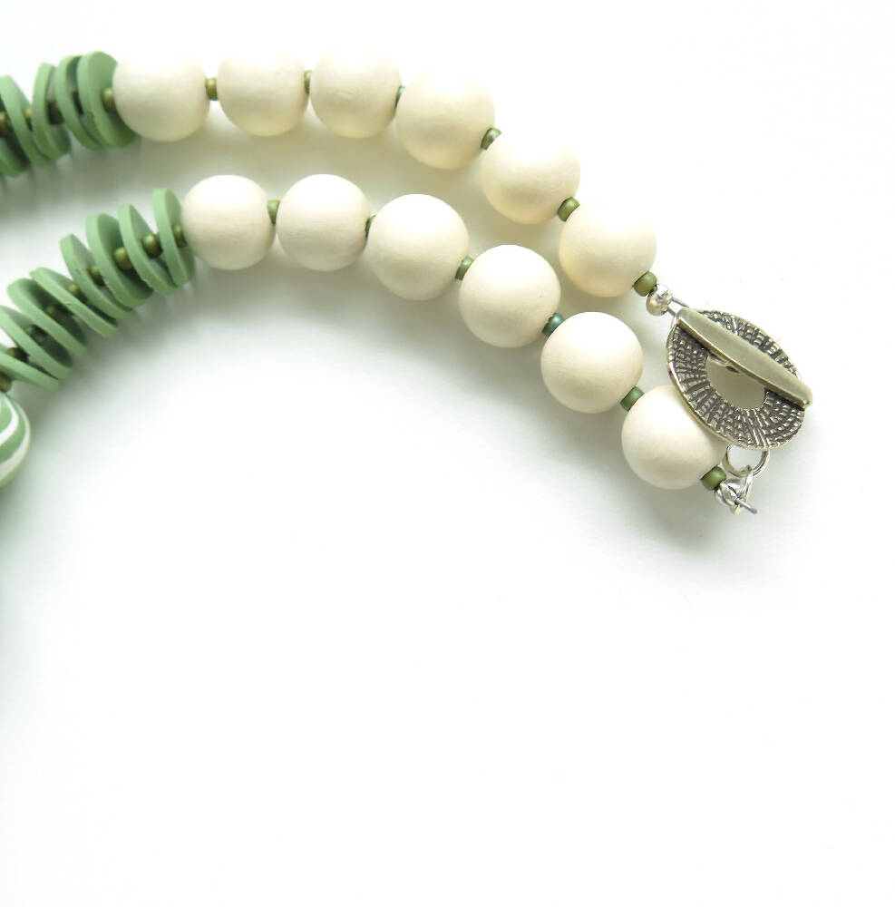 Green swirls polymer clay necklace