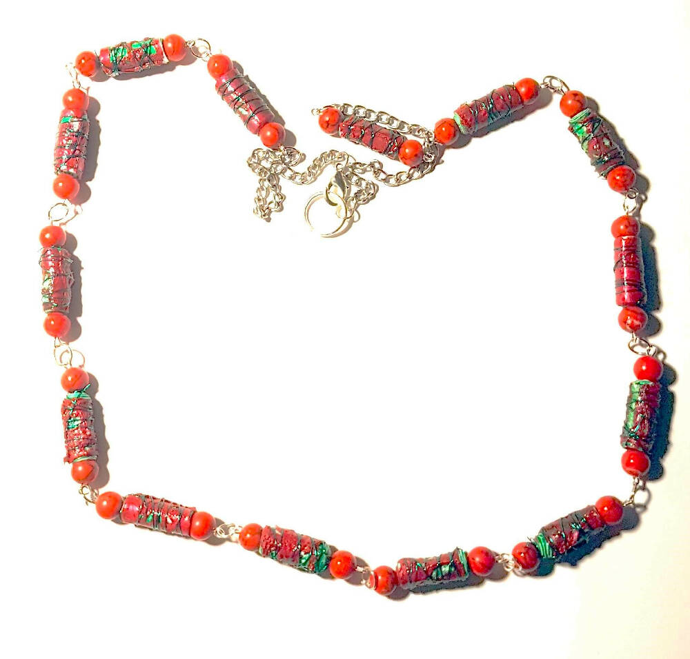 Beaded necklace, red and green fabric beads.