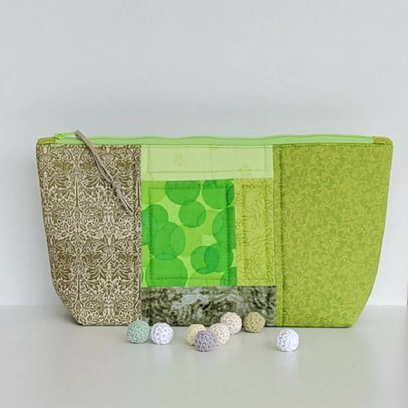 Bright green zippered bag/pouch.