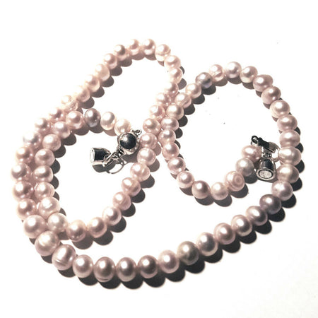 Beaded necklace glass pearls, pink and grey.