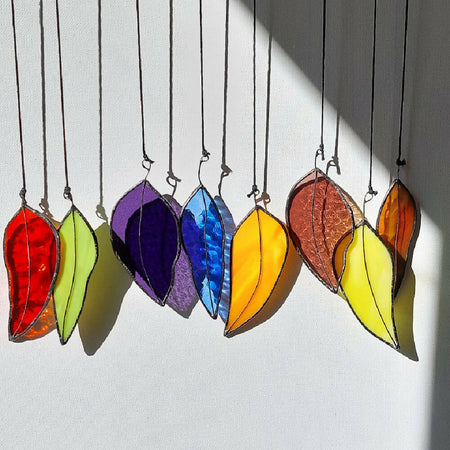 Suncatcher set of eight stained glass gum leaves, a happy colourful gift