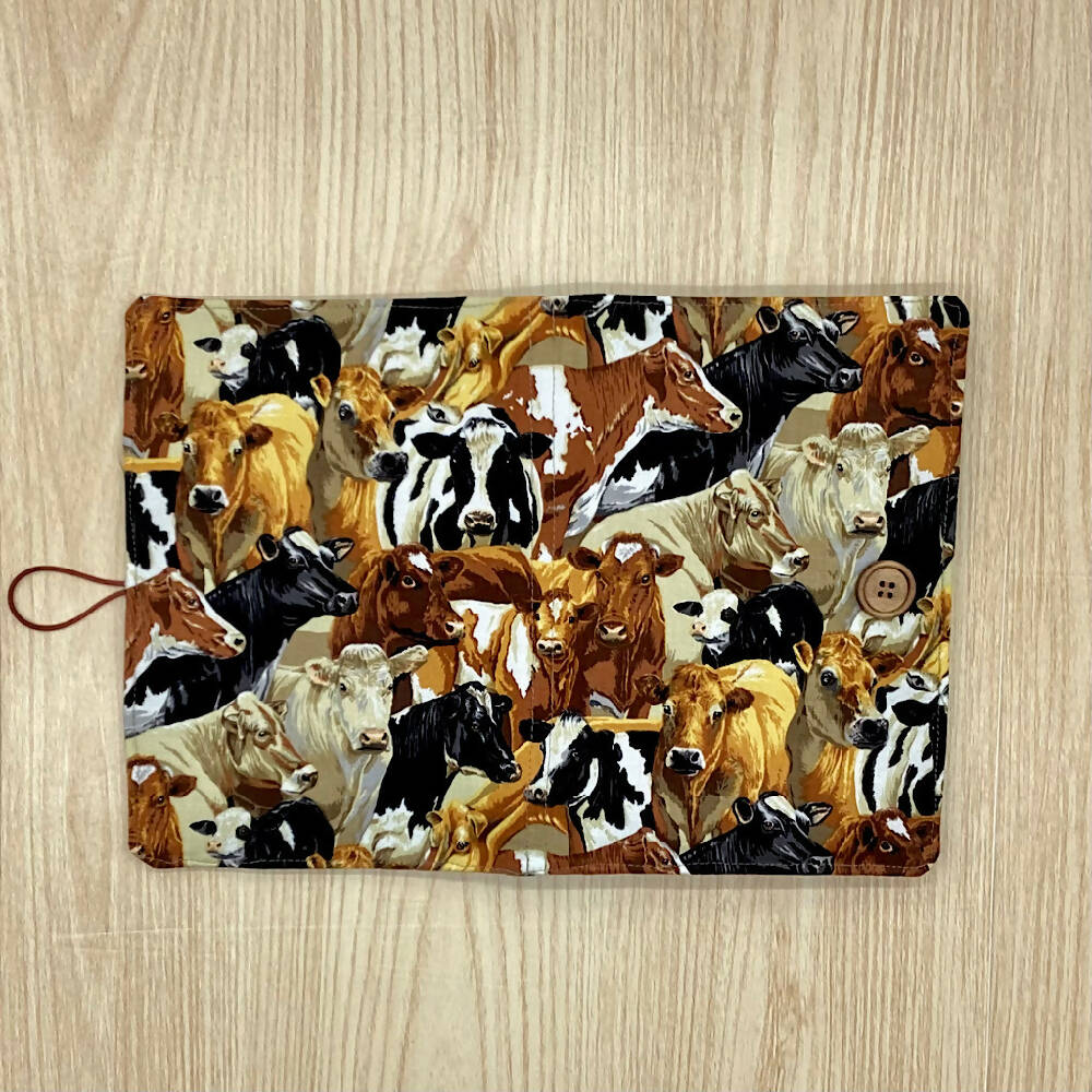 Mixed cows refillable A5 fabric notebook cover with bonus book and pen.