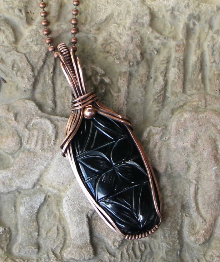 Carved Black Onyx in Copper with chain