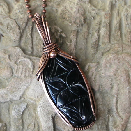 Carved Black Onyx in Copper with chain
