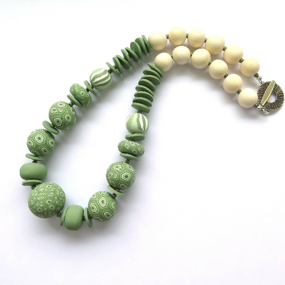 Green swirls polymer clay necklace
