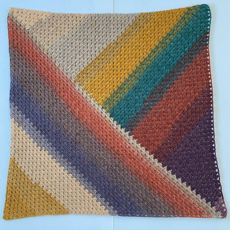 Baby blanket hand made crochet in autumnal colours