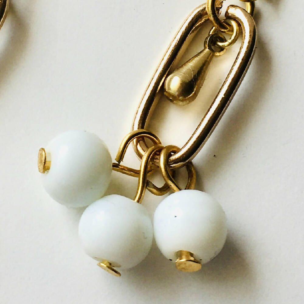 Black, white and gold dangle earrings