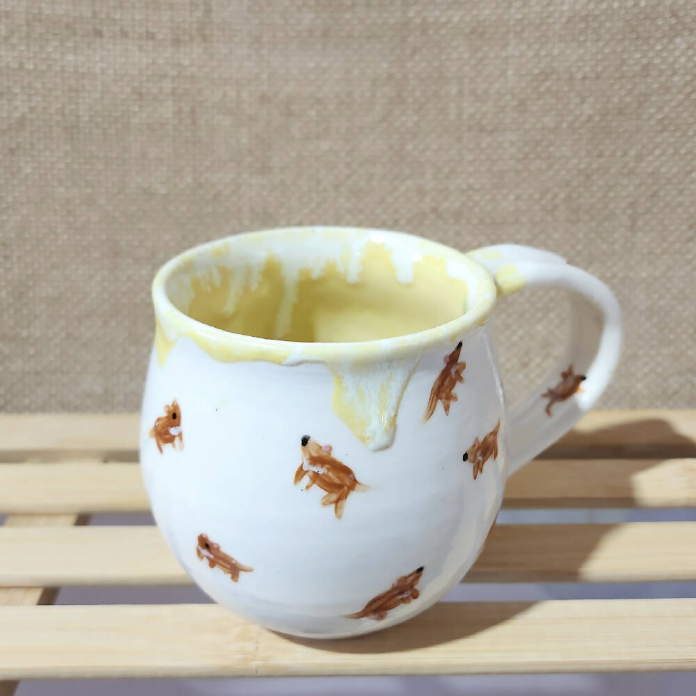 lemon yellow glazed porcelain tassie devil doodle mug, handmade in tassie