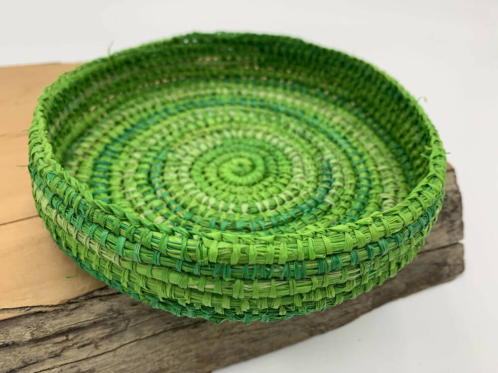 Basket in shades of green raffia