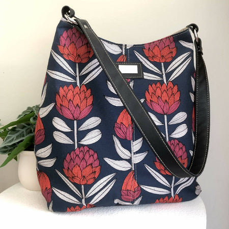 Canvas and Black Leather Shoulder Bag in Red Protea
