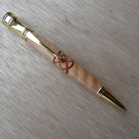 Curly Maple with a red gum insert celtic knot Secret Top pen