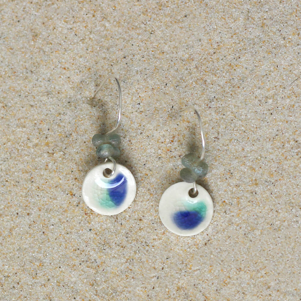 Ceramic silver dangle earrings with blue glass beads