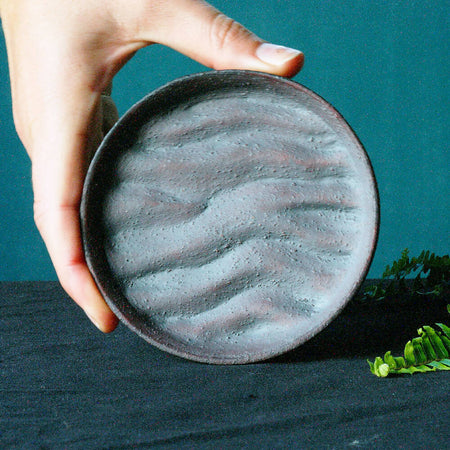 Ceramic plate in sculpted sand; trinket/snack dish