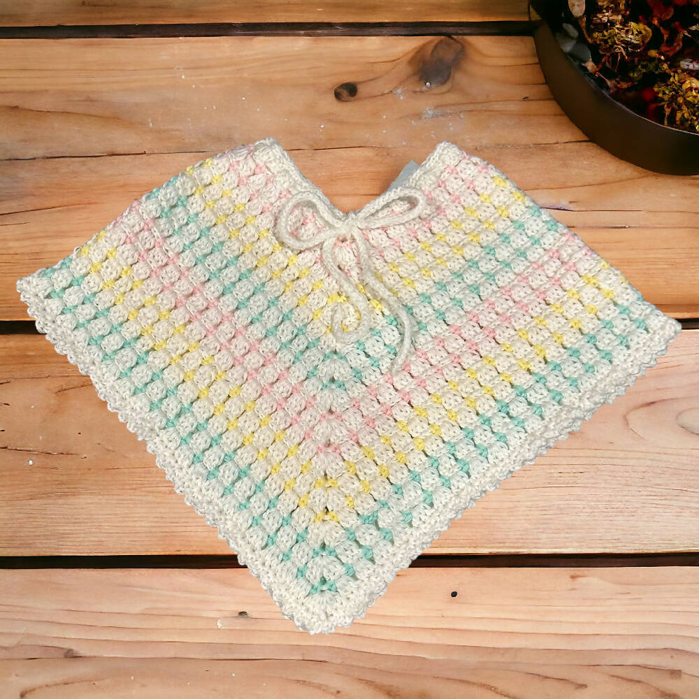 Handmade crochet baby poncho