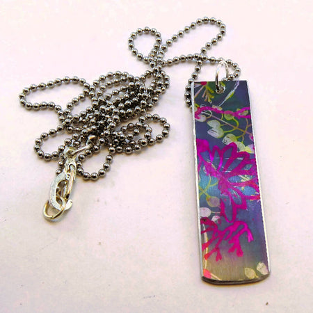 Printed and dyed pink and grey anodised aluminium pendant