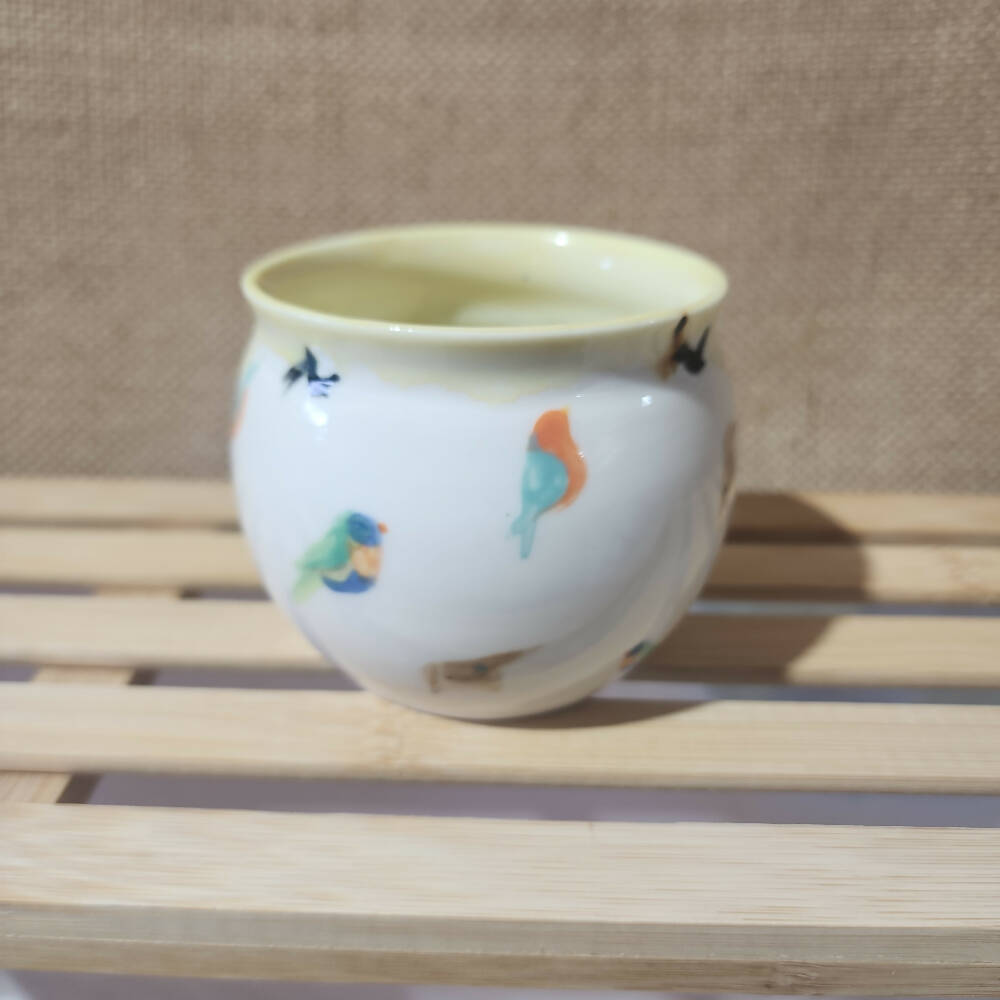 lemon yellow glazed porcelain birb doodle mug, handmade in tassie