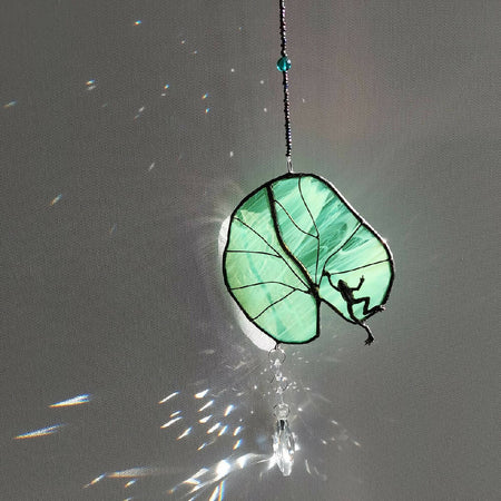 Pewter frog on stained glass suncatcher lily pad with crystals