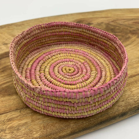 Raffia basket in pink and sand colours