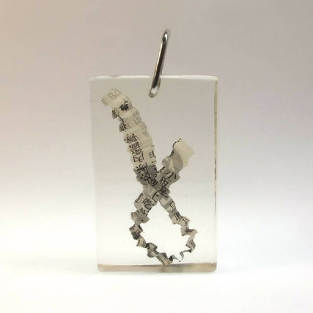 Resin with crimped paper and sterling silver pendant