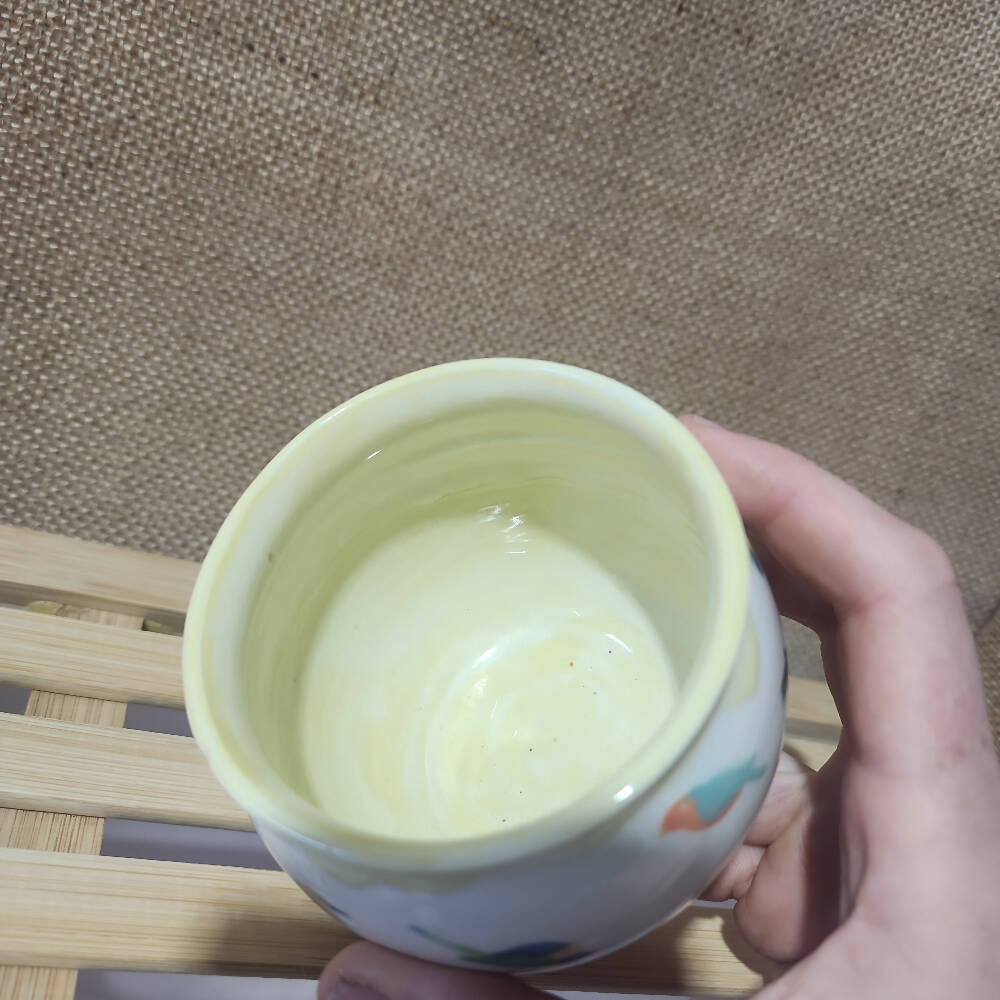 lemon yellow glazed porcelain birb doodle mug, handmade in tassie