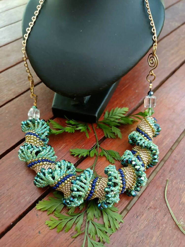 Gorgeous handmade seed beaded chunky spiral necklace in aqua turquoise and gold tones