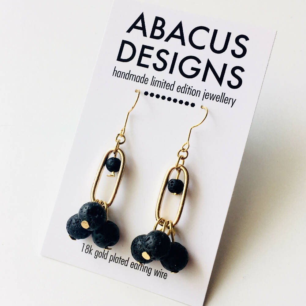 Black, white and gold dangle earrings