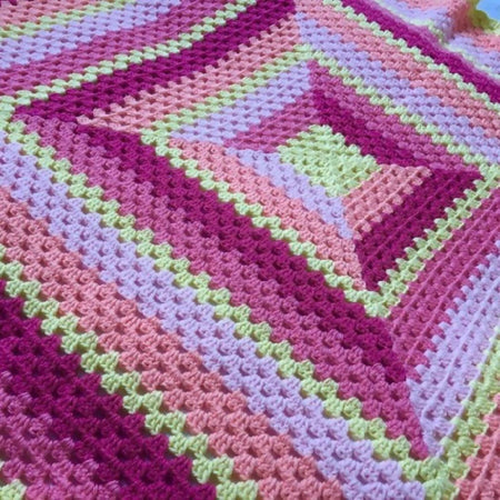 Baby crochet blanket hand made in bright granny stripes