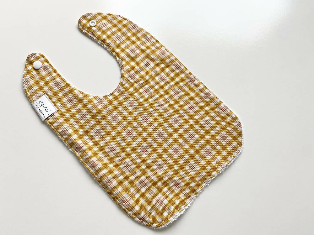Mustard tartan bib