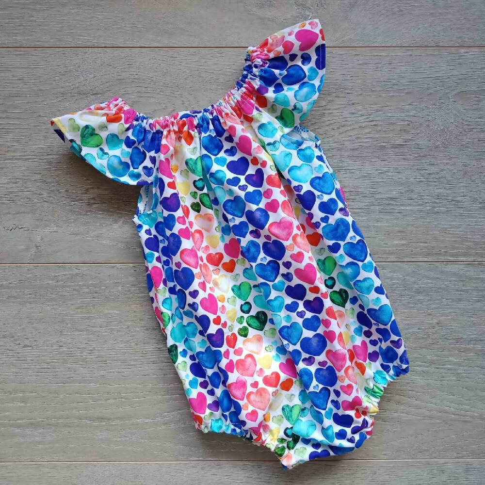 Rainbow hearts romper