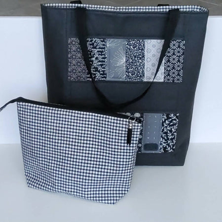 Black and white tote with zippered pouch.